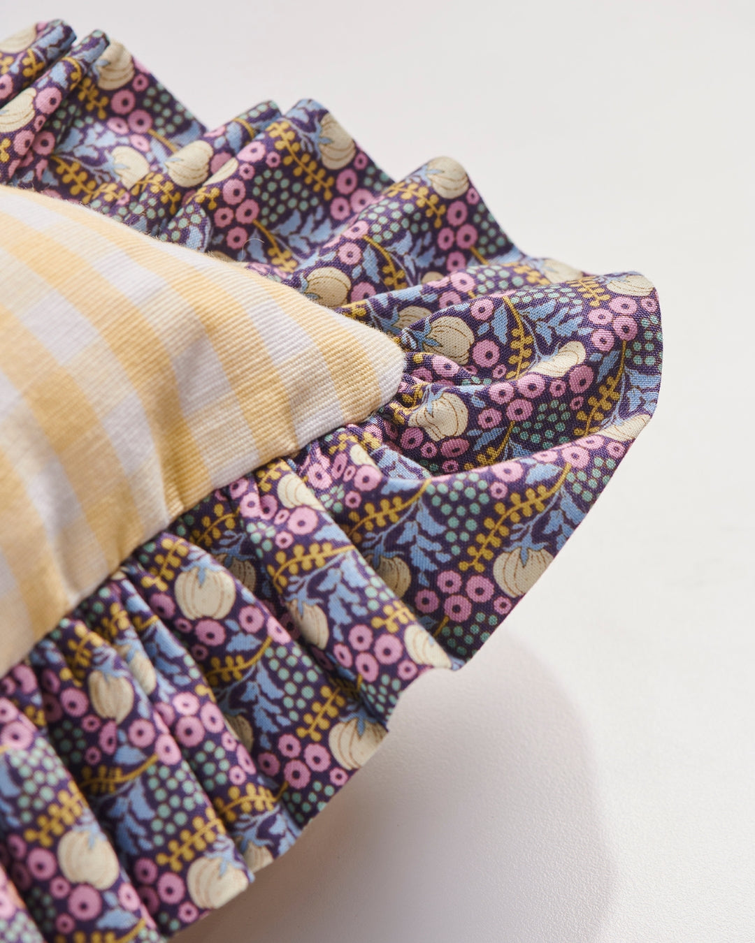 Ann Walters Lemon + Lilac Ruffle Pillow